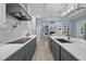 Modern kitchen features sleek countertops, stainless steel appliances, and an open layout to the living space at 71012 Russell, Chapel Hill, NC 27517