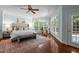 Bright main bedroom with large windows, hardwood floors, and a comfortable, inviting space at 71012 Russell, Chapel Hill, NC 27517