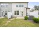 Private backyard with a patio, partial fencing, and an installed air conditioning unit at 72 S Grey Abbey Dr, Clayton, NC 27527
