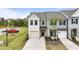 Charming townhome featuring a well-manicured lawn and a private driveway at 72 S Grey Abbey Dr, Clayton, NC 27527