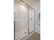 Modern stand-up shower features a glass door and tiled floor at 72 S Grey Abbey Dr, Clayton, NC 27527