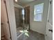 Modern bathroom featuring a glass enclosed shower with tiled walls and bench at 753 Swim Cave Ln, Wendell, NC 27591