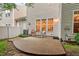 Cozy backyard patio with a table and chairs perfect for outdoor dining and relaxation at 8013 Morrell Ln, Durham, NC 27713