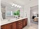 Double sink bathroom showing a walk-in shower and separate soaking tub at 8013 Morrell Ln, Durham, NC 27713