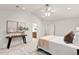 Airy main bedroom featuring vaulted ceilings and warm decor, offering comfort and style at 8013 Morrell Ln, Durham, NC 27713