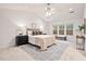 Spacious main bedroom with vaulted ceilings, lots of light, and comfortable decor at 8013 Morrell Ln, Durham, NC 27713