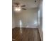 Well lit bedroom featuring ceiling fan, wood look floors, and double hung window at 805 Da Vinci St, Durham, NC 27704