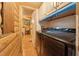 Laundry area adjacent to bedroom featuring side by side washer dryer at 8089 Crawford Currin Rd, Oxford, NC 27565