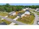 An aerial view of a charming neighborhood featuring a home with a well-manicured lawn at 95 Buckthorn Dr, Youngsville, NC 27596