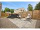 Outdoor patio area featuring comfortable hanging chairs and a luxurious hot tub at 95 Buckthorn Dr, Youngsville, NC 27596