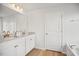 Bathroom with double granite sinks, soaking tub and glass enclosed shower at 95 Buckthorn Dr, Youngsville, NC 27596