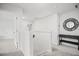 Bright hallway featuring carpeted floors, white walls and trim, and natural light at 95 Buckthorn Dr, Youngsville, NC 27596