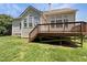 Beautiful backyard featuring a wood deck perfect for entertaining at 1005 Augustine Trl, Cary, NC 27518