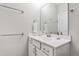 Bathroom featuring a clean vanity with neutral cabinets, chrome fixtures, and a mirror, creating a functional and stylish space at 102 Bella Rose Drive, Chapel Hill, NC 27517