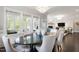 Bright dining room with view to an adjacent living room at 102 Bella Rose Drive, Chapel Hill, NC 27517