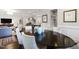 Large dining room with dark table and chair set that seats six at 102 Bella Rose Drive, Chapel Hill, NC 27517