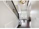 Bright entryway with hardwood floors, a staircase, and a clear view of the home's interior layout at 102 Bella Rose Drive, Chapel Hill, NC 27517