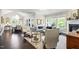 Inviting living room featuring abundant natural light, stylish decor and comfortable seating at 102 Bella Rose Drive, Chapel Hill, NC 27517