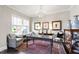 Bright office space with natural light, a classic chandelier, and decorative furnishings at 102 Bella Rose Drive, Chapel Hill, NC 27517