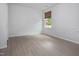 Bedroom with wood-look flooring and a window at 1021 Benay Rd, Morrisville, NC 27560