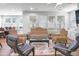 Open living room with hardwood floors, abundant natural light, and stylish furniture, creating a welcoming and airy atmosphere at 1021 Benay Rd, Morrisville, NC 27560