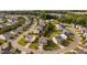 Aerial view of a neighborhood showcasing various home styles in a lovely community at 105 Putters Ct, Durham, NC 27703