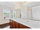 Bathroom with double sinks and good lighting at 105 Putters Ct, Durham, NC 27703