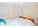 Comfortable bedroom featuring soft carpet, a ceiling light, and a bright interior at 105 Putters Ct, Durham, NC 27703