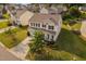 Aerial view showcasing a beautiful two-story home with a well-manicured front yard and inviting curb appeal at 105 Putters Ct, Durham, NC 27703