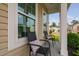 Inviting front porch with stylish seating and a clear view of the neighborhood at 105 Putters Ct, Durham, NC 27703