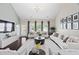 Spacious living room with vaulted ceiling, comfortable seating, and lots of natural light at 105 Putters Ct, Durham, NC 27703