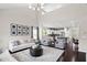 Open concept: View of the living room and kitchen showcasing layout, design, and bright lighting at 105 Putters Ct, Durham, NC 27703