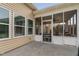 The exterior of the sunroom featuring large windows and an entrance for easy access at 105 Putters Ct, Durham, NC 27703