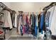 Organized walk-in closet with hanging racks for clothing storage at 105 Putters Ct, Durham, NC 27703