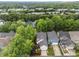 Aerial view showcasing the neighborhood surrounded by mature trees at 10579 Evergreen Spring Pl, Raleigh, NC 27614