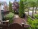 Serene backyard with lush greenery and manicured garden space at 10579 Evergreen Spring Pl, Raleigh, NC 27614
