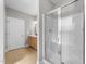 Bathroom with a glass door shower and a double sink vanity at 10579 Evergreen Spring Pl, Raleigh, NC 27614
