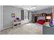 Cozy bedroom with a bunk bed and gray walls at 10579 Evergreen Spring Pl, Raleigh, NC 27614