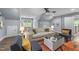Comfortable living room with bright rug and modern furniture at 10579 Evergreen Spring Pl, Raleigh, NC 27614