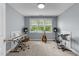 Multipurpose room with musical instruments and neutral carpeting at 10579 Evergreen Spring Pl, Raleigh, NC 27614