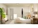 Bright bedroom featuring an open closet, a modern dresser, and stylish decor at 108 Fishing Pier Way, Lillington, NC 27546