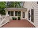 Beautiful back deck with direct access to the sunroom and backyard, providing a seamless indoor-outdoor flow at 108 Vescova Ln, Morrisville, NC 27560