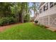 Spacious backyard with mature trees at 108 Vescova Ln, Morrisville, NC 27560