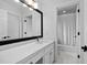 Bathroom with double sink, vanity, and classic mirror at 108 Vescova Ln, Morrisville, NC 27560