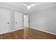 Bedroom with hardwood floors and multiple doors at 108 Vescova Ln, Morrisville, NC 27560