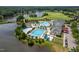 High angle view of community pools with ample seating, offering a luxurious leisure experience near the lake at 108 Vescova Ln, Morrisville, NC 27560