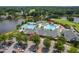 Stunning aerial view of the community pools, showcasing a resort-style living experience by the water at 108 Vescova Ln, Morrisville, NC 27560