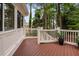 Deck featuring painted white railings and green tree backdrop at 108 Vescova Ln, Morrisville, NC 27560