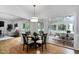 View of the dining room with seating for four with access to a sunroom at 108 Vescova Ln, Morrisville, NC 27560