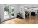 The entryway with light filled french doors and access to the open concept kitchen at 108 Vescova Ln, Morrisville, NC 27560